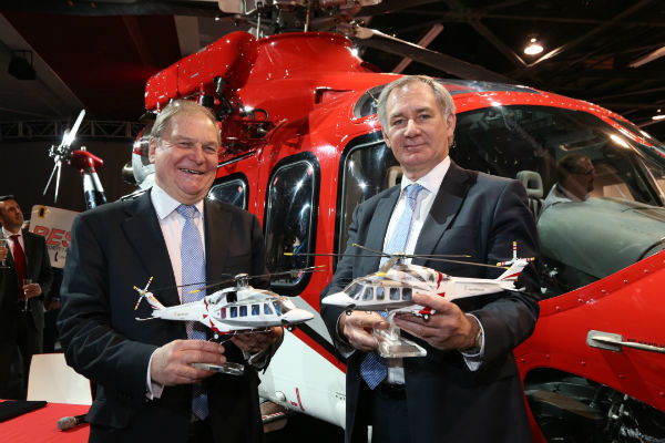 Crispin Maunder (left) of LCI and Geoff Hoon of AgustaWestland at Heli-Expo 2014