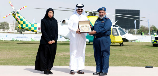 Dr Hanan Al Kuwari (left) with HE Abdulla Khalid Al Qahtani, Minister for Health and Major General Ghanim bin Shaheen Al Ghanim in front of one of the new AW139 helicopters