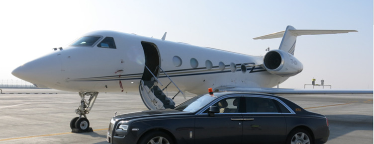 Gulfstream 405 corporate jet with an executive car.